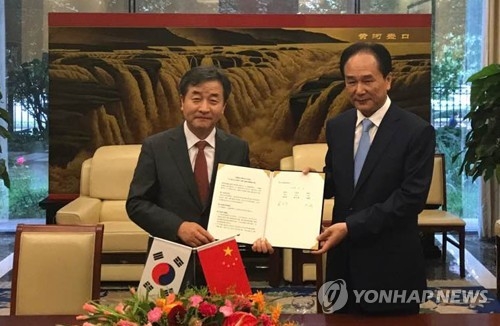 7��18��A�b�_�ʡA���p��������|�̡]���^�P�s�ت��������W��ñ�p����������@�쯬�֥����V���Ϥ��i���̸ѳƧѿ��C�]���p���^