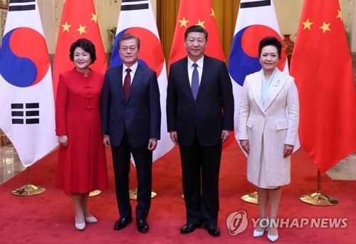 ��ƹϤ��G12��14��U�ȡA�b�_�ʤH���j�|��A�n���`�Τ�b�G���צP�����a�D�u�ߪ񥭥��צb�����w������W�X�v�C�]���p���^