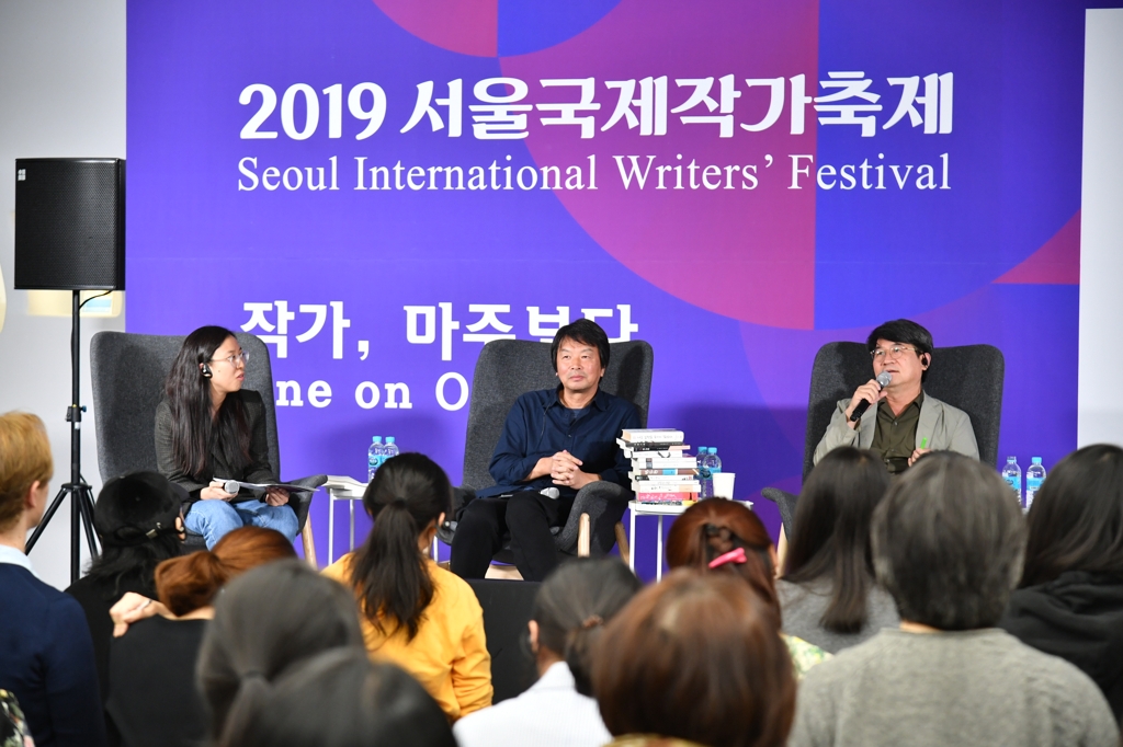 10��12��U�ȡA������ڧ@�a�`�PŪ�̭��ﭱ���ʦb�����F�j���]�p�s���]DDP�^�|��A����@�a�B�_���]���G�^�X�u���ʡC ���p��/�n�����½Ķ�|�ѹϡ]�Ϥ��Y�T����ƻs�^