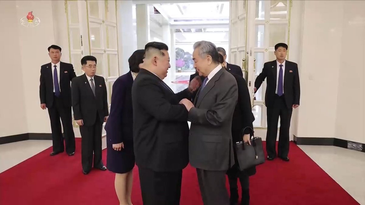 �������|������~������