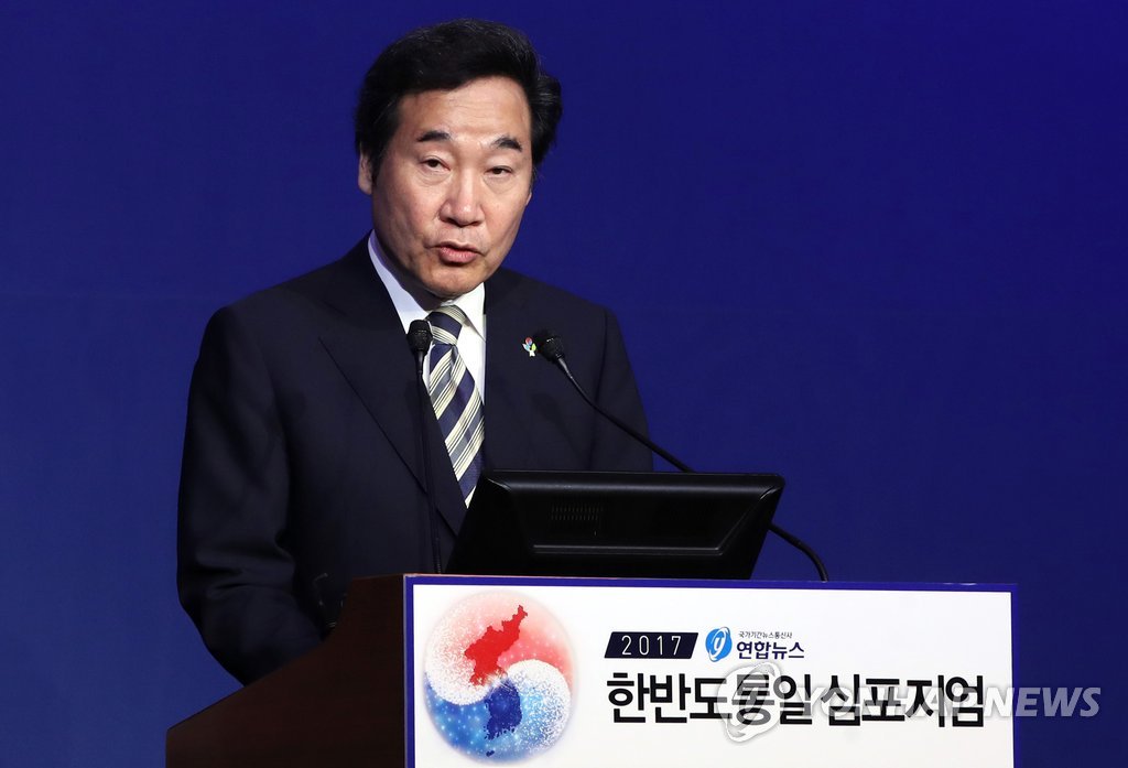 6月29日,在首爾市中區樂天酒店,南韓國務總理李洛淵出席韓聯社與南韓統一部合辦的“2017韓半島統一研討會”並致賀辭。(韓聯社)