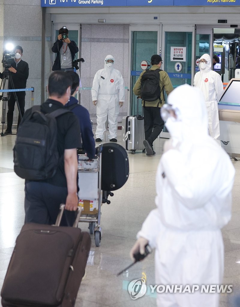 資料圖片:旅印韓僑回國。 韓聯社