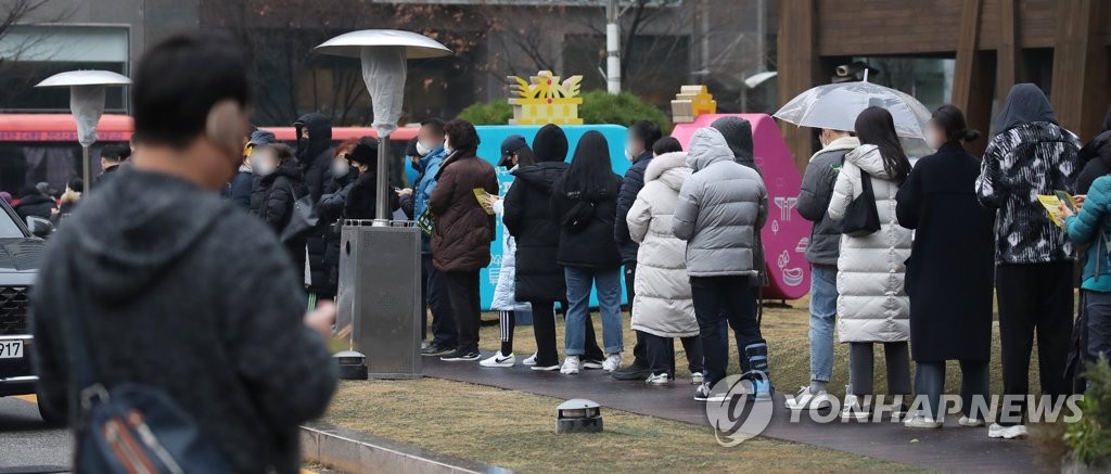 資料圖片:排隊待檢 韓聯社